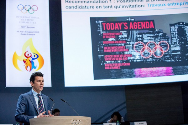 IOC Executive Director Christophe Dubi presents bid changes at 128th IOC Session (IOC Photo)