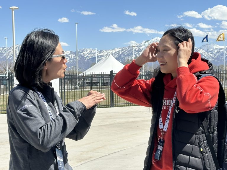 IOC Future Host Commission's Hong Zhang reunites with "sister" at Utah Olympic Oval, April 12, 2024 (GamesBids Photo)